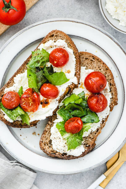 istock Roasted tomatoes and ricotta rye bruschetta 1299622624
