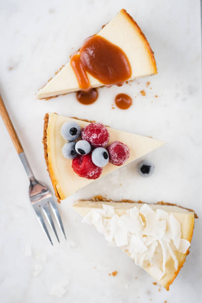 istock Three slices of cheesecake 1299622648