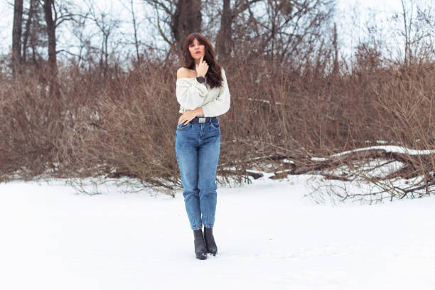 istock Winter walk in a snowy park 1299623807