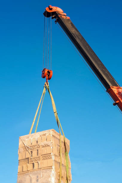 istock arrow of a construction crane against the sky 1299623837