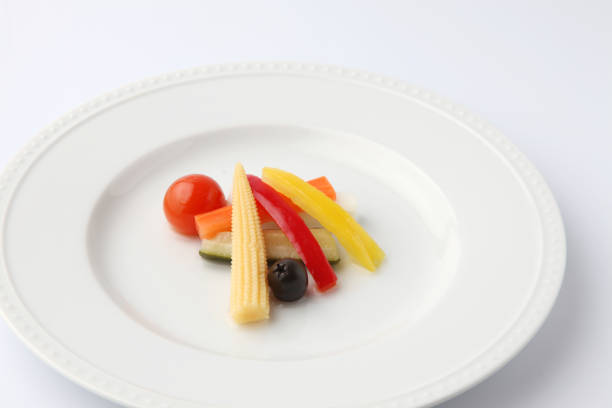 pickles pickled vegetables salad on plate isolated on white background