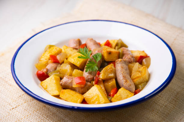 istock Salchichas stew with potatoes and paprika 1299624142