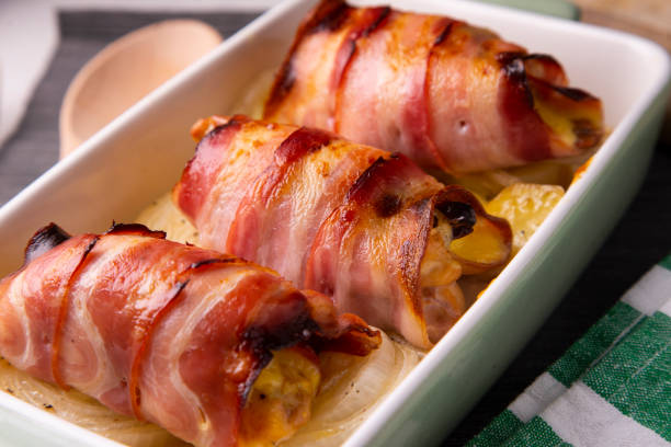 istock Roll with bacon and chicken backed in the oven 1299624229