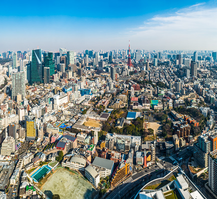 Tokyo Tower downtown skyscrapers crowded highrise cityscape aerial panorama Japan