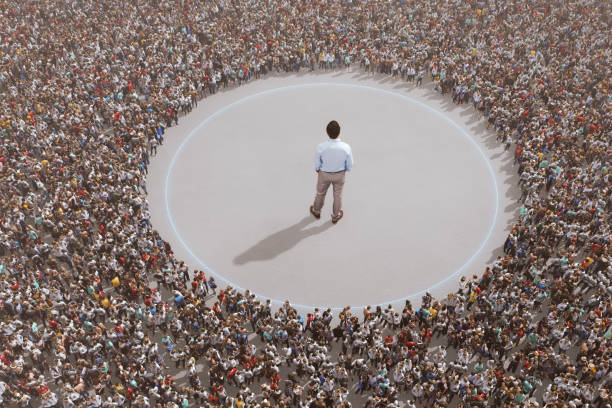 Large group of people with individual standing out