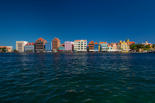 Colorfull historic facades on the Handelskade in Willemstad, Curacao.