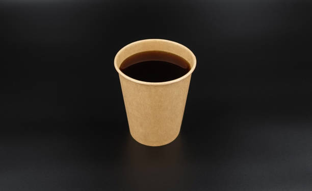 istock Close up take-out coffee cup Isolated on background 1299628836