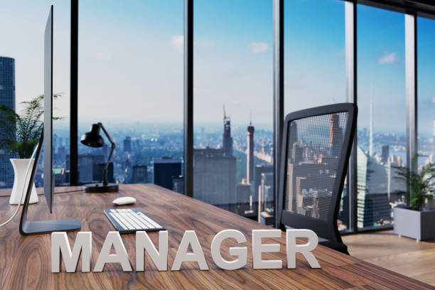 istock manager; office chair in front of modern workspace with computer and skyline view; company concept; 3D Illustration 1299628879