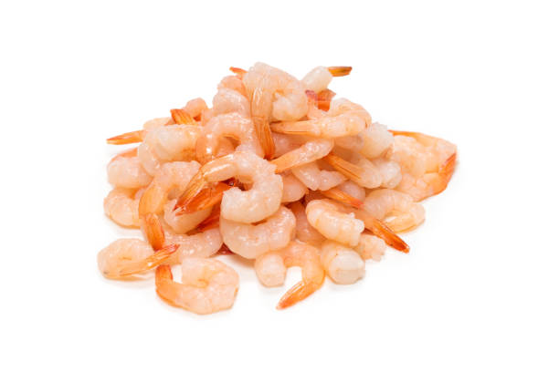istock Frozen shrimps background. Top view. 1299633446