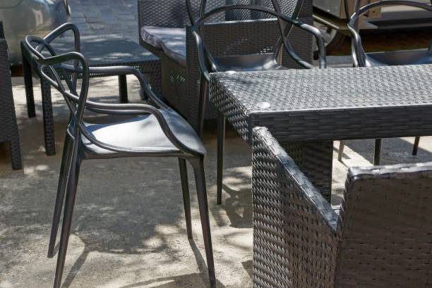 istock black  table and chair on the asphalt 1299634594