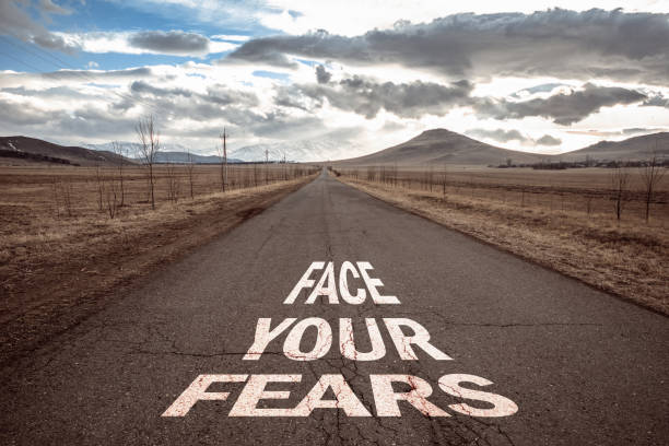 istock face your fears on road 1299634849