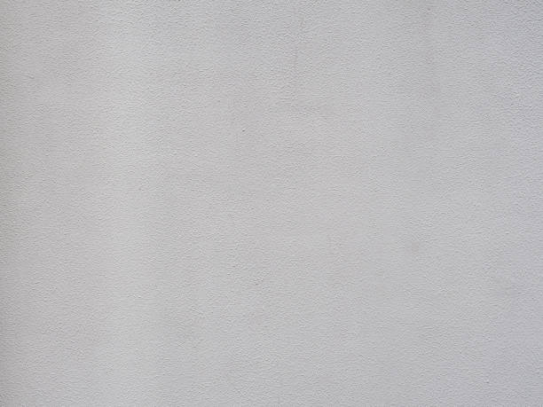 istock Light wall with rough decorative plaster. Texture not seamless. Fullscreen photo 1299636458