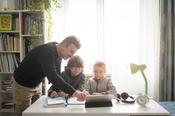 istock The children make video calls for homework with their fathers. 1299638885