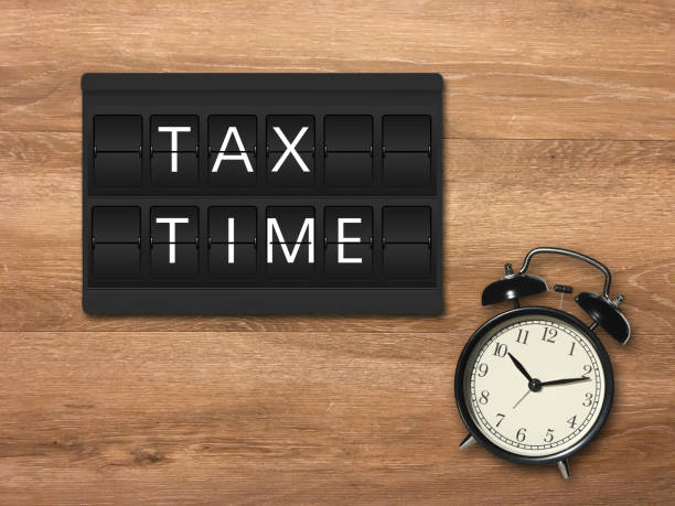 fecha límite de recordatorio de tiempo de impuestos - calendar tax april day fotografías e imágenes de stock