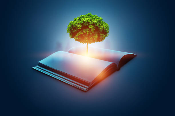 istock Image of a green tree growing from a book on a blue background. Creative background, concept of extermination of trees, paper production. 1299643941