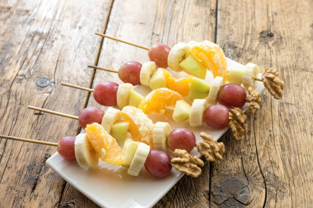 istock Skewers of healthy fruit 1299644352