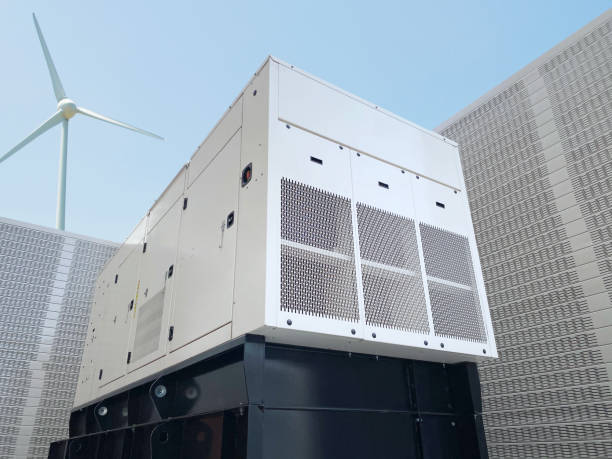 istock Standby generator and wind turbine 1299645193