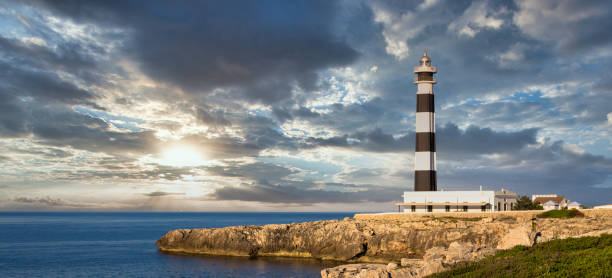 istock Scenic Artrutx Lighthouse at sunset in Minorca, Spain 1299646757