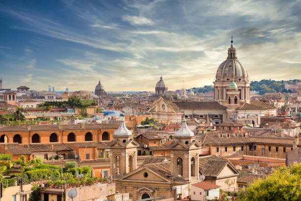 istock Rome cityscape with sunset sky and clouds, Italy 1299646950