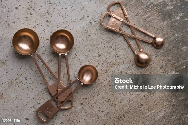Copper Measuring Spoons Stock Photo - Download Image Now - Color Image, Copper, Copy Space
