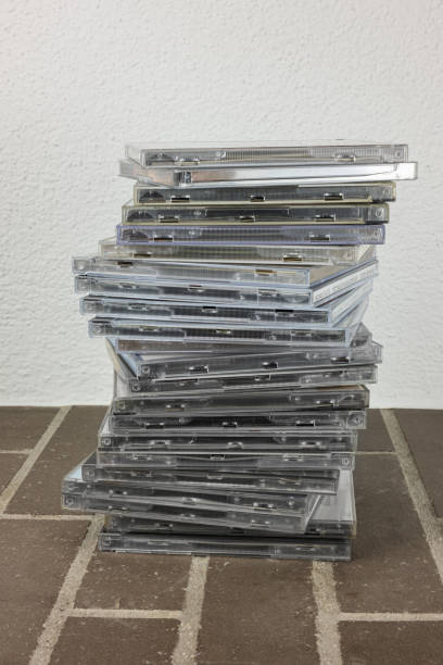 istock Bunch of old compact discs on the brick floor 1299649128