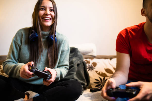 istock A happy couple playing video games 1299649946
