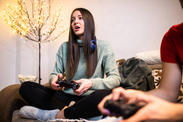 istock A young woman complaining while playing a video game with her boyfriend 1299649959