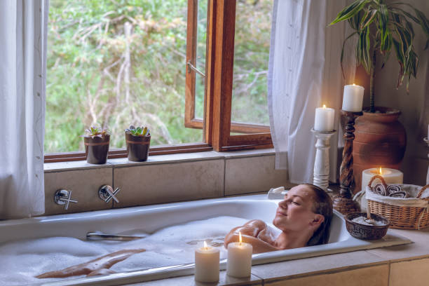 istock Pretty Female with Pleasure Taking Bath 1299652462