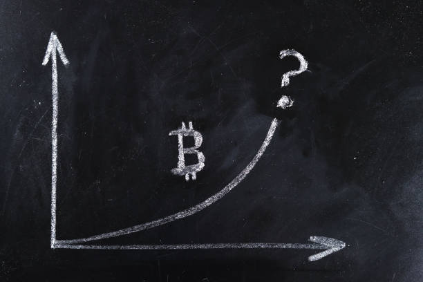 istock Bitcoin exchange rate chart on a chalkboard. The concept the prediction of the course 1299652542