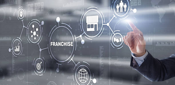 Businessman hand touching inscription Franchise marketing system. Businessman hand touching inscription Franchise marketing system franchising photos stock pictures, royalty-free photos & images