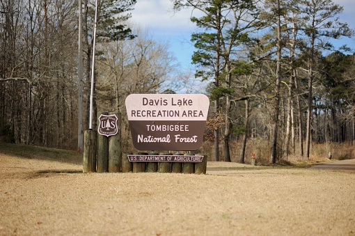 New Houlka, Mississippi - January 23, 2021: Davis Lake Recreation Area Sign along County Road 124 in the Tombigbee National Forest near New Houlka, Mississippi.