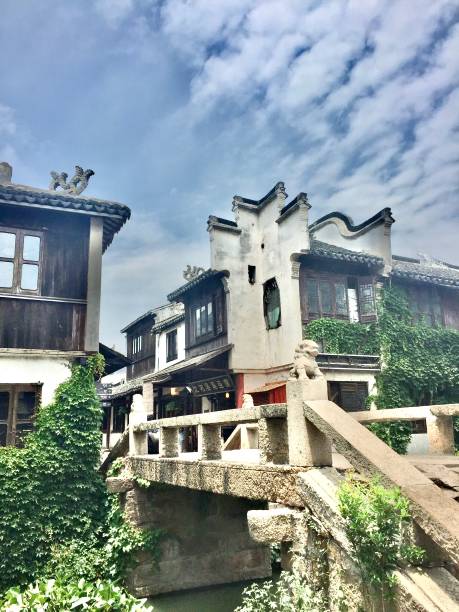 Zhouzhuang is noted for its typical Chinese water-town features, its well-preserved ancient residential houses, and unique cultural landscape with a long history. Zhouzhuang is Located in Kunshan, 38 km southeast of the city center of Suzhou. In summer sunny day. water town zhouzhuang china stock pictures, royalty-free photos & images