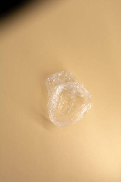 istock plastic transparent bag on beige background. The concept of environmental protection 1299655470