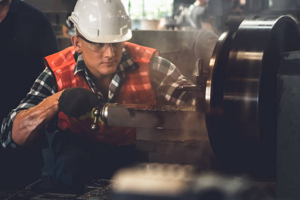 istock Smart factory worker or engineer do machine job in a manufacturing workshop 1299656337