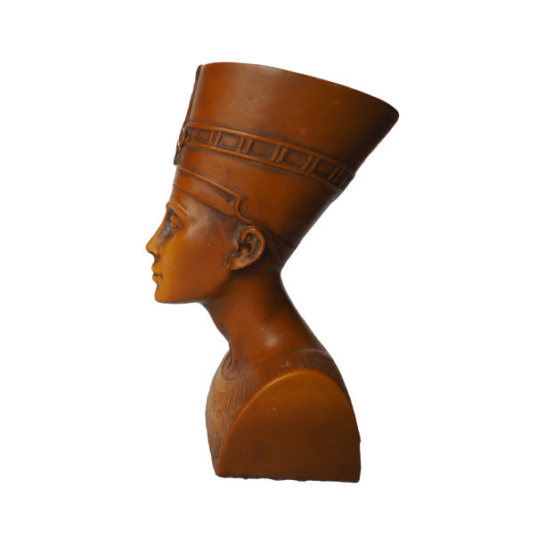 Bust or statue of the ancient Egyptian queen Nefertiti made of brown stone on a white background. Isolate. The symbol of eternal female beauty. Bust or statue of the ancient Egyptian queen Nefertiti made of brown stone on a white background. Isolate. The symbol of eternal female beauty pyramid giza pyramids close up egypt stock pictures, royalty-free photos & images