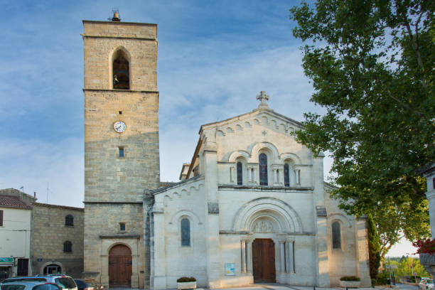 istock Church of Fabregues (France)  with its bell tower 1299658777