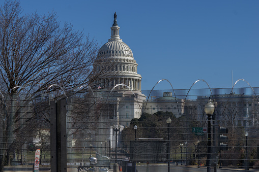 Washington D.C., January 30, 2021:  Fences were erected around Capitol after January 6 when pro-Trump protesters rallied in DC ahead of Electoral College vote count and some stormed into the Capitol.