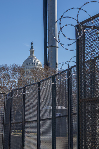 Washington D.C., January 30, 2021:  Fences were erected around Capitol after January 6 when pro-Trump protesters rallied in DC ahead of Electoral College vote count and some stormed into the Capitol.