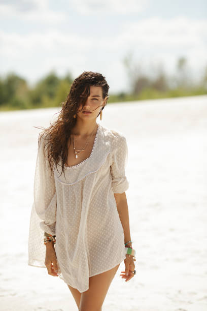 istock Woman Resting on the Beach During Vacation 1299663258