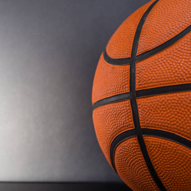 istock Close up ball with black background and copy space 1299664286