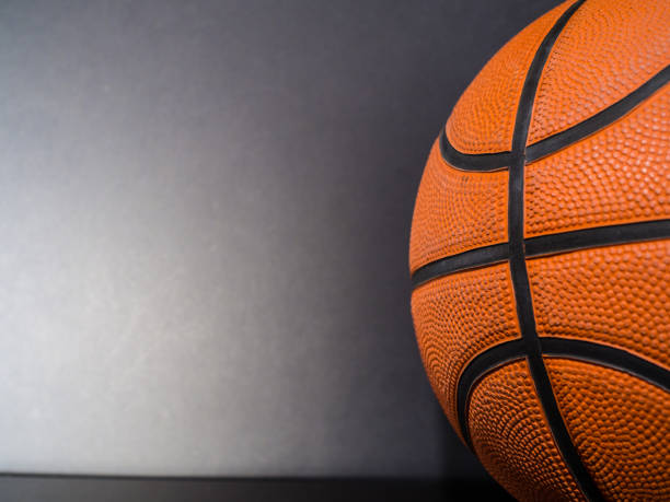 istock Close up ball with black background and copy space 1299664294