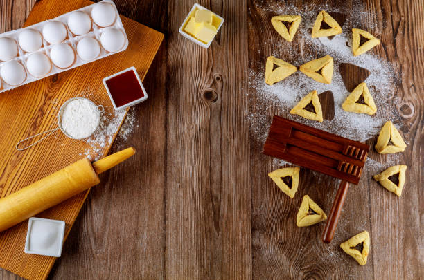 istock Making hamantaschen jewish cookies with ingredients. 1299668668