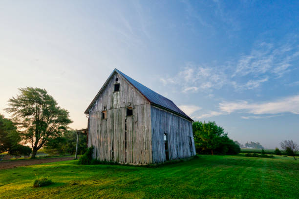 istock Old weathered barn at sunrise-Howard County Indiana 1299672683