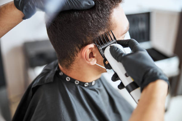 istock Image of getting hair cut with hair machine 1299674611