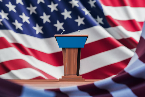 istock Election debate table over USA flag background 1299675538