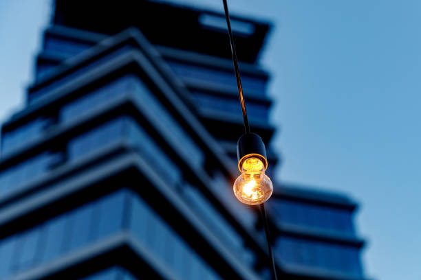 Light bulb on the background of building, outdoor