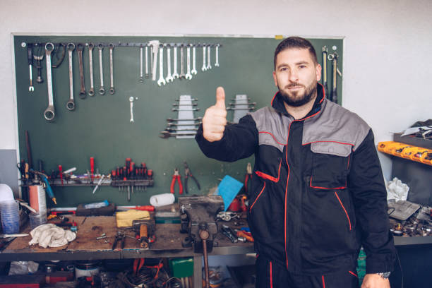 istock Portrait of a mechanic in a workshop 1299683342