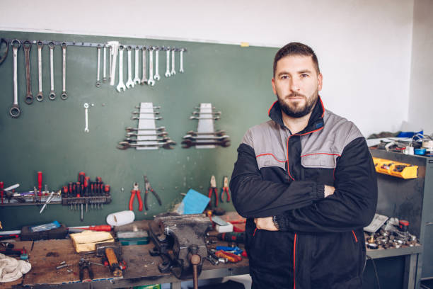 istock Portrait of a mechanic in a workshop 1299683390