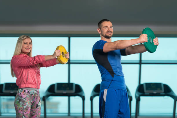istock Group Of People Workout With Weight 1299689477