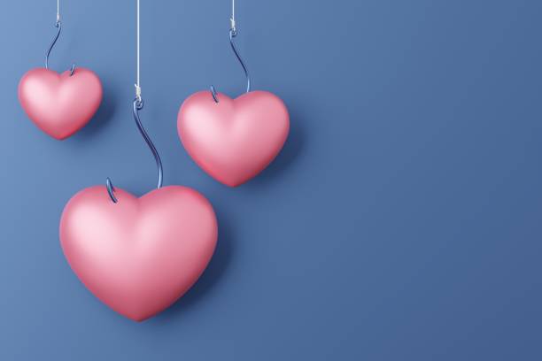 istock Hanging Heart symbol 3D rendering pink color with fishhook, Valentine's Day fall in love concept design on blue background with copy space 1299692006